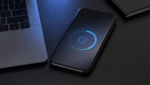 iPhone software security update on a desk with a shield icon